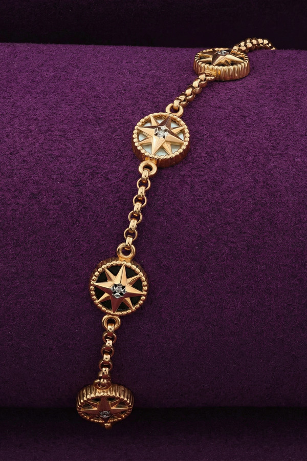 Браслет из золота c бриллиантами, ониксом и перламутром