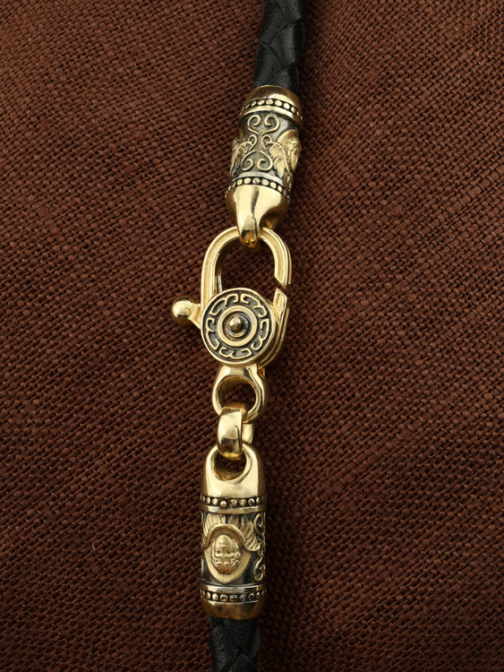 Гайтан из лимонного золота c кожаным шнурком и ониксом