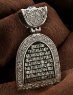 Образок из белого золота 585 пробы c эмалью, сапфиром и бивнем мамонта