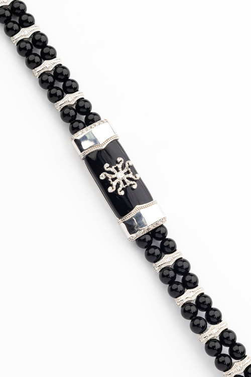 Браслет из белого золота c бриллиантами и ониксом