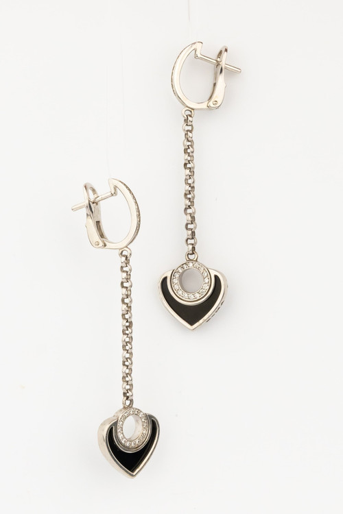 Серьги из белого золота c бриллиантами и ониксом