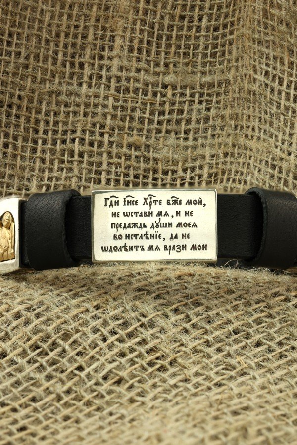 Браслет из серебра 925 пробы и золота 750 пробы c кожаным шнурком