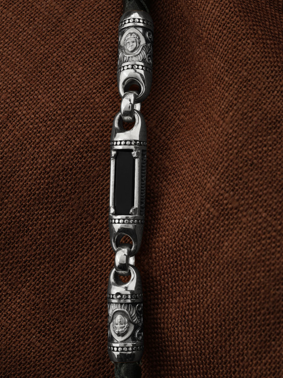 Гайтан из белого золота c кожаным шнурком и ониксом