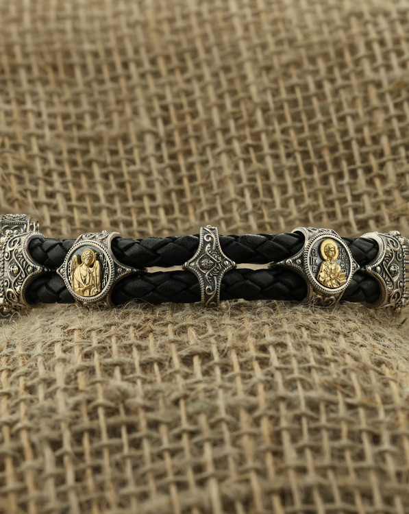 Браслет из серебра и золота c кожаным шнурком и ониксом