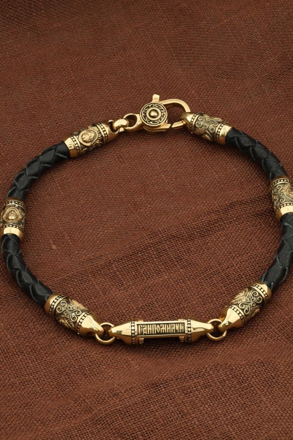 Браслет из лимонного золота c кожаным шнурком и ониксом