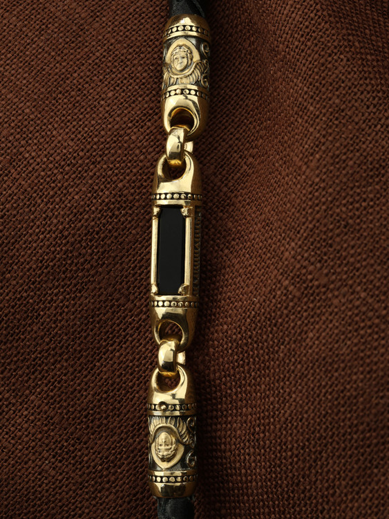 Гайтан из лимонного золота c кожаным шнурком и ониксом