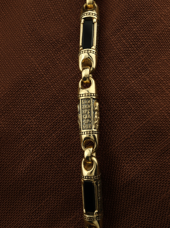 Гайтан из лимонного золота c кожаным шнурком и ониксом